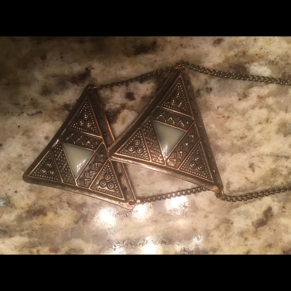 Triangle shaped jade mounted necklace.